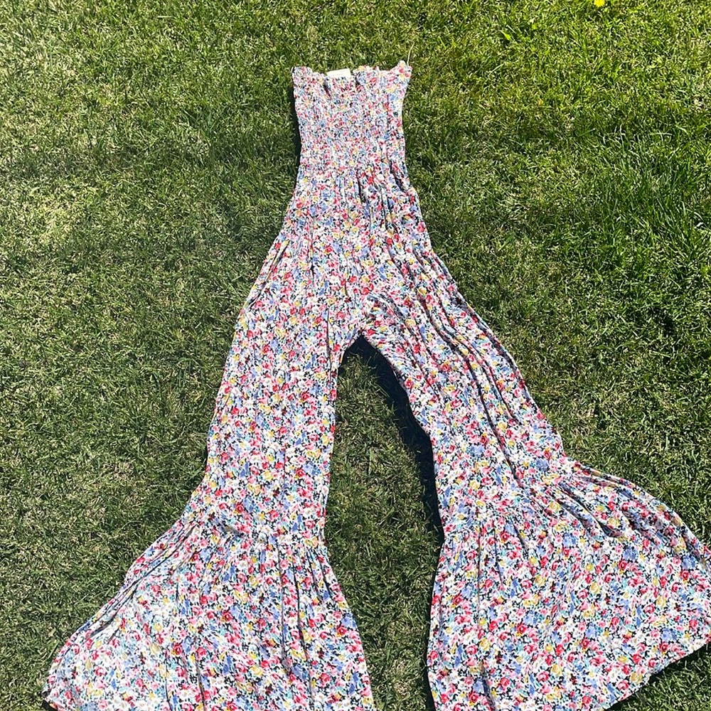 Tube top floral jumpsuit with bell bottoms